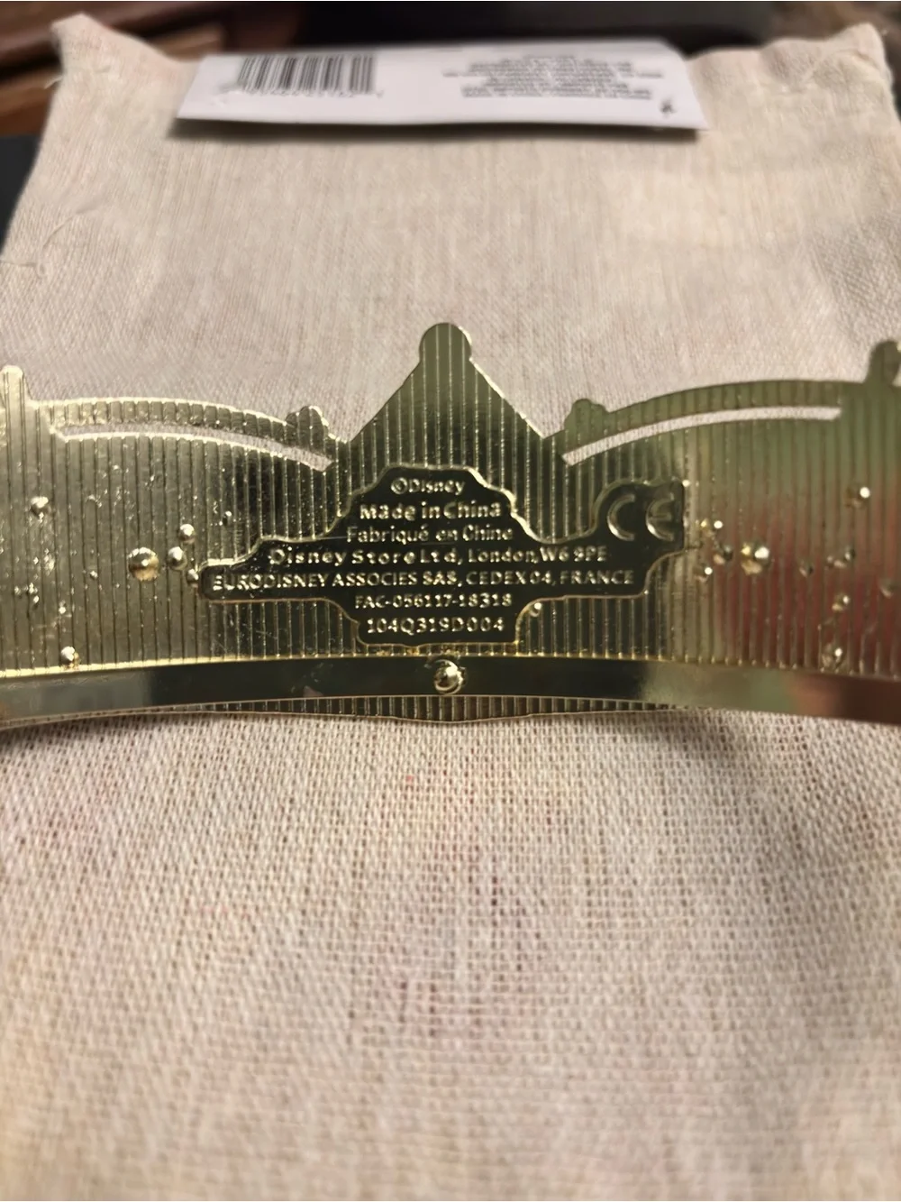 Disney gold tone